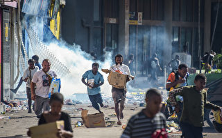 骚乱酿16死 中国店遭抢 巴新宣布紧急状态