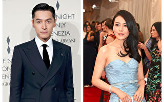 与高圆圆携合拍新片走红毯 胡歌一举动获大赞