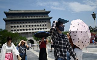 中国北方高温多地破40℃ 南方暴雨或现洪水