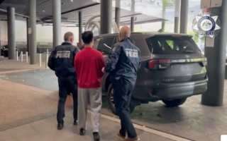 涉外国干预案 两中国公民在澳洲首都过堂