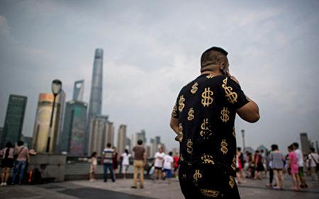 【中国观察】经济低迷阴影下的欠债人
